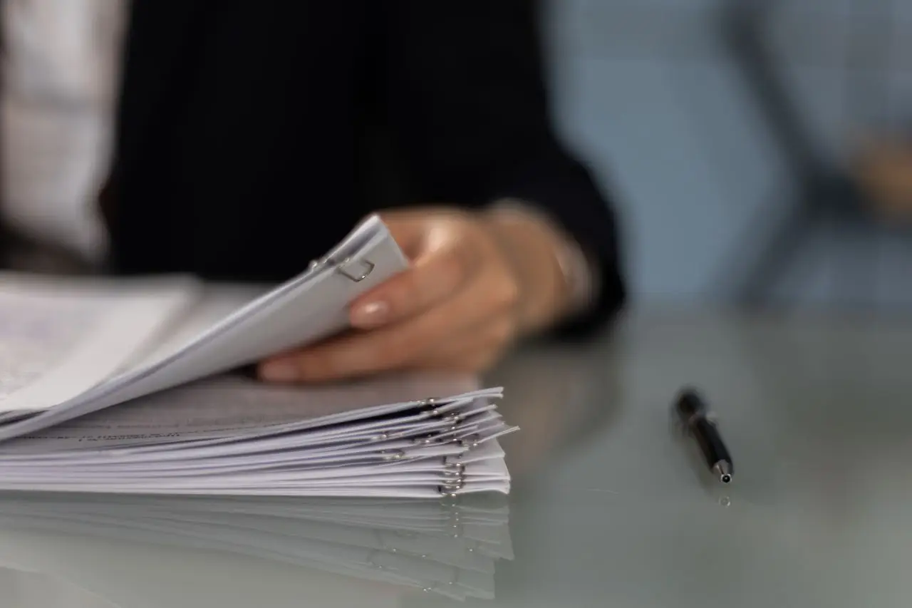 Paperwork and a calculator on a tidy desk